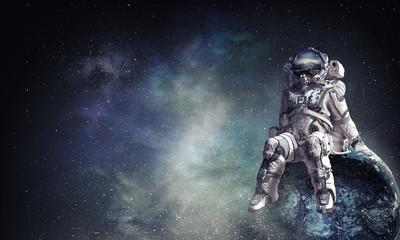 Wall Mural - spaceman in cosmos. mixed media