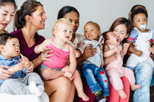 Diverse Babies With Their Parents