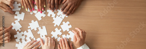 Cuadros en Lienzo Above top panorama copyspace for text diverse hands people assemble jigsaw puzzle put pieces together search common decision