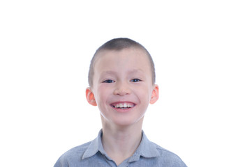 happy smiling boy portrait isolated on white background. happiness childhood for cute adorable child face