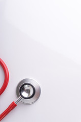 Wall Mural - Stethoscope On White Background with selective focus and crop fragment