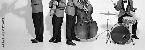 Photo Jazz band players on white. Vintage music background