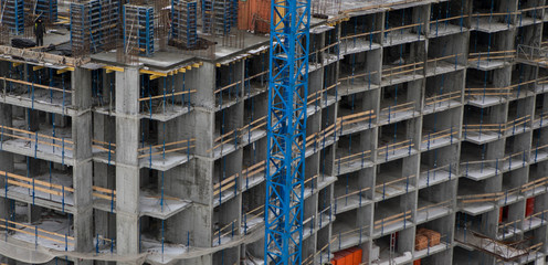 Tower crane at the construction site.