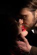 Bearded Man kisses a beautiful girl