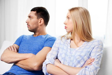 people, relationship difficulties, conflict and family concept - unhappy couple having argument at home