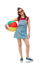 Wall Mural - leisure, summer holidays and people concept - smiling teenage girl in sunglasses with beach ball over white background