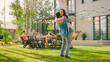 © Gorodenkoff - Beautiful Young Girl Hugs Her Boyfriend. Two Young People Embrace in the Backyard of a Garden on a Hot Summer Day.