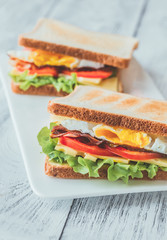 Wall Mural - Sandwiches with fried egg and bacon