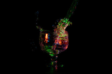 Alcohol being poured in wine glass