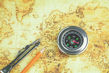 compass and map on the table