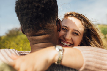 Wall Mural - romantic interracial couple outdoors