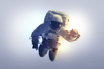 Wall Mural - astronaut afloat - elements of this image furnished by nasa