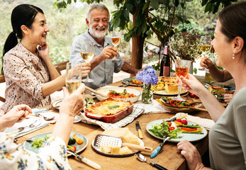 Friends having dinner in the garden