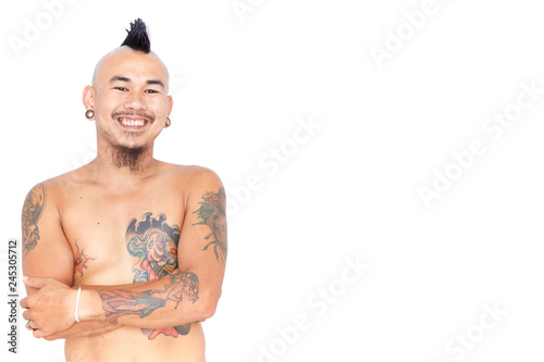 Portrait Of Friendly Asian Punk Guy With Mohawk Hair Style