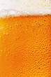 Texture of light filtered beer close up