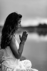 Wall Mural - Meditating. Close Up Female Hands Prayer