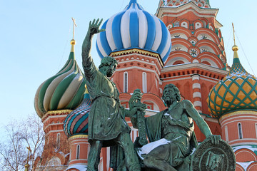 View to the monument to Minin and Pozharsky and St. Basil's Cathedral. Russian landmark on Red square in Moscow