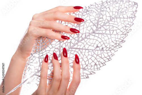 Εκτύπωση καμβά Bright festive red manicure on female hands. Nails design