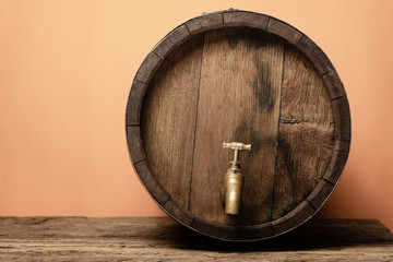 Aufkleber - Wooden barrel with tap and worn old table of wood.