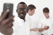 © ASDF - close up.young businessman taking a selfie.