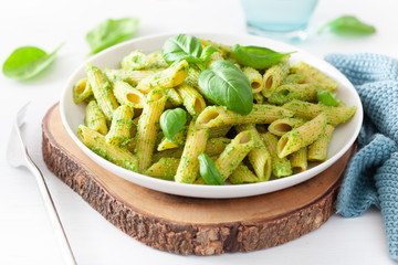 Wall Mural - penne pasta with spinach basil pesto sauce