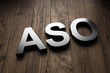 Dimensional ASO sign on wood with copy space