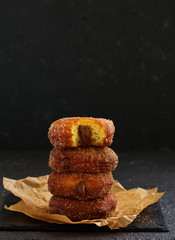 Wall Mural - Donuts with cinnamon and chocolate cream. Homemade baking. Selective focus.