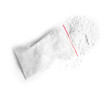 Cocaine in plastic bag on white background, top view