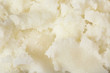 © New Africa - Fresh shea butter as background, top view. Cosmetic product