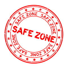 Wall Mural - Grunge red safe zone word round rubber seal stamp on white background