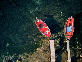 Poster - Wooden pier with fishing boats top view