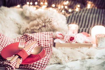 Wall Mural - Valentine's Day festive dinner on a wooden background cutlery