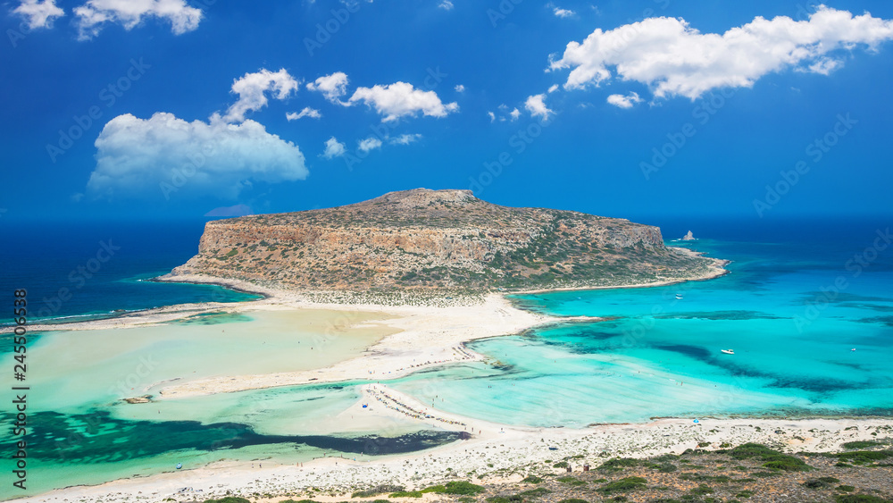 Obraz na płótnie Balos lagoon on Crete island, Greece. Tourists relax and bath in crystal clear water of Balos beach. w salonie