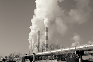 Power plant, smoke from the chimney. Toned image