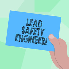 Poster - Conceptual hand writing showing Lead Safety Engineer. Business photo showcasing develop policies to ensure safety of an all concerns Drawn Hu analysis Hand Holding Blank Color Paper Cardboard