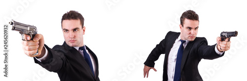 Man in suit with gun isolated on white Tableau sur Toile