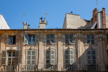 Wall Mural - Beautiful weathered apartment buildings in the charming city of Aix-en-Provence