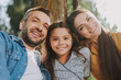 © Yakobchuk Olena - Happy family is enjoying leisure on weekend