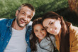 © Yakobchuk Olena - Smiling family is spending wonderful weekend outdoor