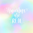 © yasnaten - Unicorns are real. Vector magic fairy tale inspiration saying on a soft blended holographic background