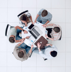 Wall Mural - top view.business team making a financial report