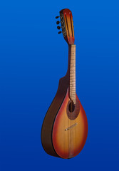 Wall Mural - Two-tone red and yellow mandolin isolated on blue background. Vertical photo.