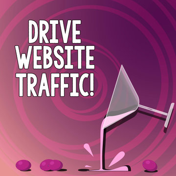 Handwriting text writing Drive Website Traffic. Concept meaning Increase the number of visitors to business website Cocktail Wine Glass Pouring Liquid with Splash Grapes and Shadow photo