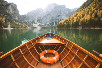 Wall Mural - Traditional rowing boat at Lago di Braies in the Dolomites