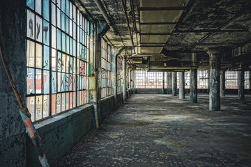 Interior view of the abandoned Fisher Body Plant factory in Detroit. The plant is abandoned and vacant ever since.