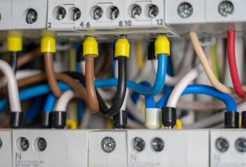 Terminals, contacts, circuit breakers wiring in electrical switchboard providing a safe supply of electricity