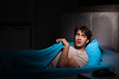 © Elnur - Young handsome man suffering from insomnia in bed