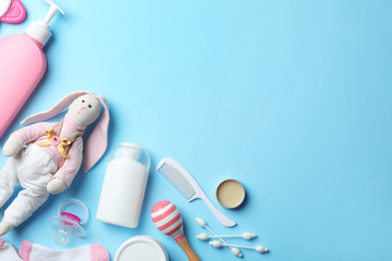 Wall Mural - flat lay composition with baby accessories and toys on color background. space for text