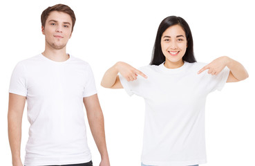 Wall Mural - Asian girl and man in blank template t shirt isolated on white background. Guy and young woman in tshirt with copy space and mock up for advertising. White shirts. Front view