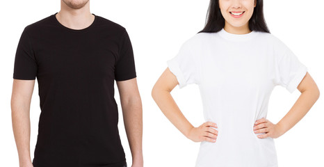 Wall Mural - Asian girl and man in blank template t shirt isolated on white background. Guy and young woman in tshirt with copy space and mock up for advertising. White and black shirts. Front view. Cropped image
